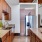 a kitchen with wooden cabinets