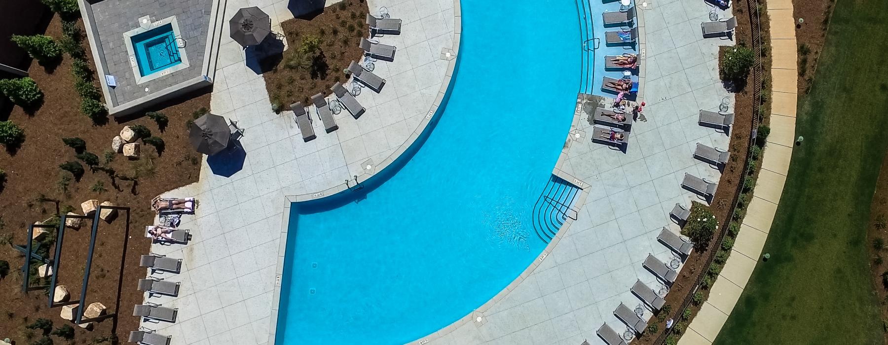 a pool with people around it