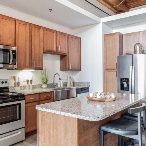 Beautiful kitchens with designer finishes a kitchen with a granite island